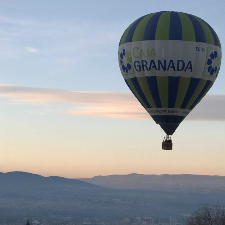 hot air balloon over the alhambra in granada